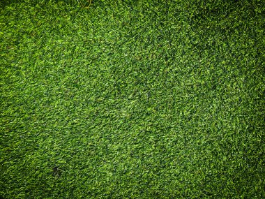 Yeşil çim futbol sahası arka planının yakın görüntüsü. Çalışma ve tasarım için duvar kağıdı.