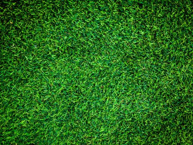 Yeşil çim futbol sahası arka planının yakın görüntüsü. Çalışma ve tasarım için duvar kağıdı.