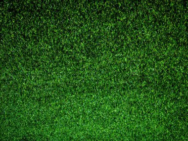 Yeşil çim futbol sahası arka planının yakın görüntüsü. Çalışma ve tasarım için duvar kağıdı.