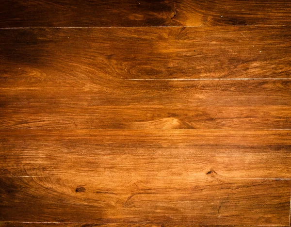 Natural dark wooden background for text and design. Top view