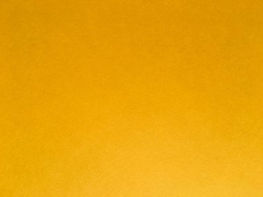 Tasarım için sarı kağıt dokusu arka planı. Kopyalama alanı olan duvar kağıdı