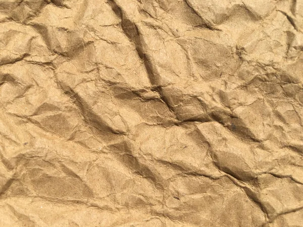 Brown wrinkle recycle paper background for Design. Blank  surface for text or work