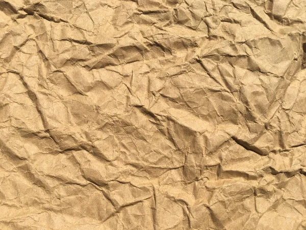 Brown wrinkle recycle paper background for Design. Blank  surface for text or work