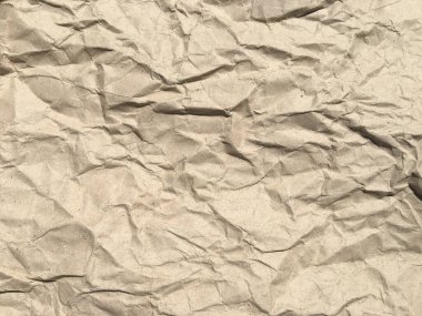 Tasarım ve iş için kopya alanı olan buruşmuş kağıt arkaplan