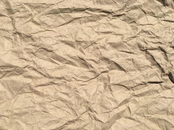 ブラウンはデザインのためのコピースペースで紙の背景を砕いた しわのある壁紙パターン — ストック写真