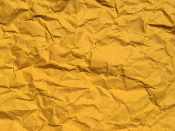 Abstract texture of yellow wrinkled paper background for Design. Copy space for text or work