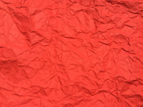 Red crumpled paper texture background for Design. Wallpaper  for copy space