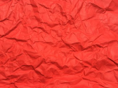 Tasarım için kırmızı buruşmuş kağıt dokusu arka planı. Kopyalama alanı için duvar kağıdı