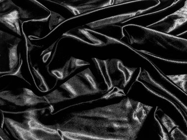 Sıvı dalga ya da dalgalı kıvrımlı siyah saten arkaplan. Duvar kağıdı tasarımı