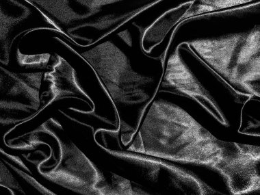 Siyah kumaş ya da kumaş arkaplanda sıvı dalga ya da dalgalı kıvrımlar. Duvar kağıdı tasarımı