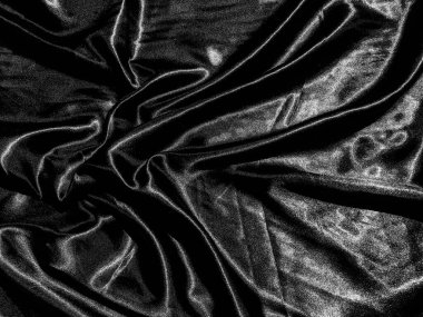 Siyah kumaş ya da kumaş arkaplanda sıvı dalga ya da dalgalı kıvrımlar. Duvar kağıdı tasarımı