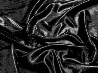 Lüks siyah ipek ya da sıvı dalgalı ya da dalgalı kıvrımlı saten arkaplan. Duvar kağıdı tasarımı