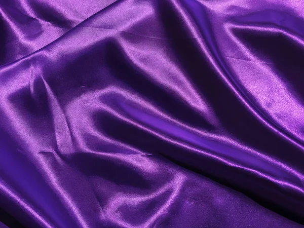 Beautiful smooth purple fabric texture background with copy space for design