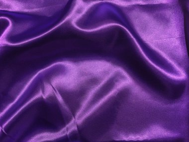 Tasarım için kopyalama alanı olan soyut mor kumaş dokusu arkaplanı