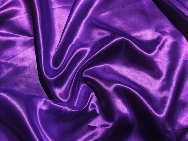 Beautiful smooth purple fabric texture background with copy space for design