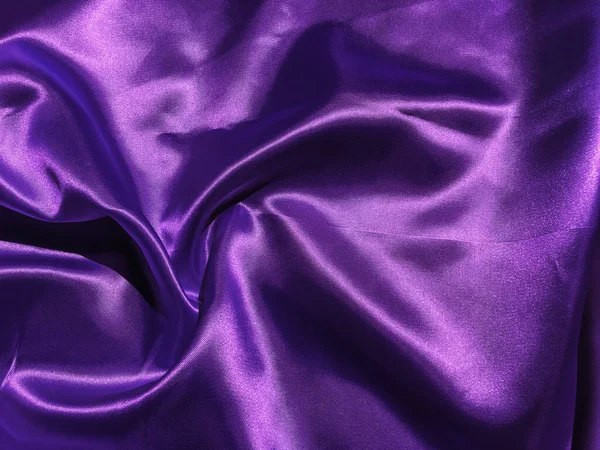 Pattern of purple fabric texture background.  wavy folds of grunge silk texture satin velvet material for design