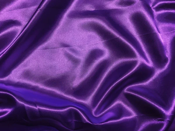 Abstract purple fabric texture background with copy space for design