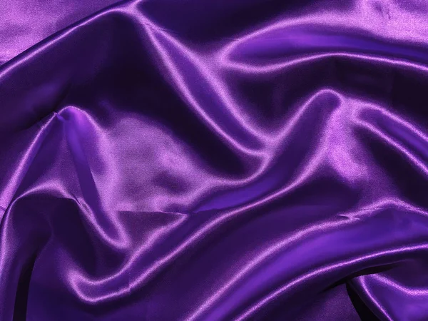 Abstract purple fabric texture background with copy space for design