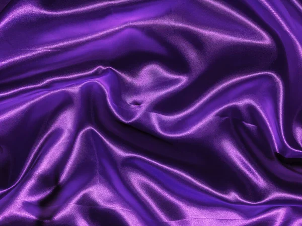 Abstract purple fabric texture background with copy space for design