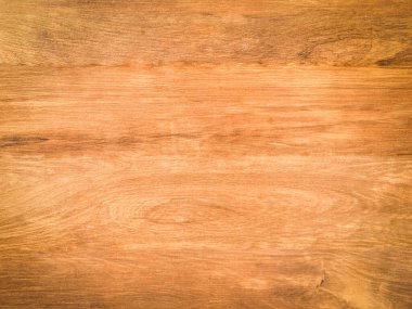 Tasarım için kopyalama alanı olan doğal arkaplan olarak ceviz ağacı ahşabı dokusu kullanılıyor. 