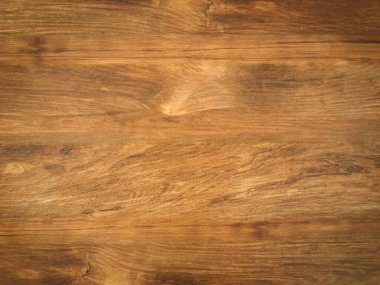 Modern ahşap dokunun doğal arkaplan olarak ve tasarım için kopya alanı olarak üst görünümü. 