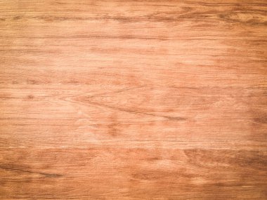 Tasarım için kopyalama alanı olan doğal arkaplan olarak ceviz ağacı ahşabı dokusu kullanılıyor. 