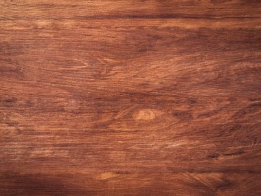 Koyu ahşap dokular, sanat eserleri için kopyalama alanı olan doğal arka plan olarak kullanılır. Üst görünüm 