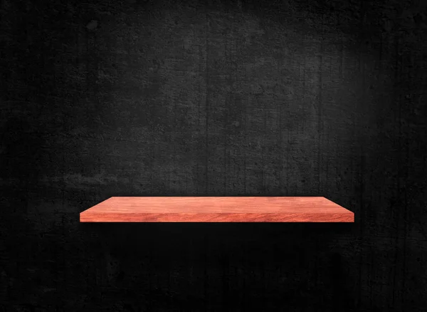 Blank of old wooden shelf on dark wall texture background with clipping path for design