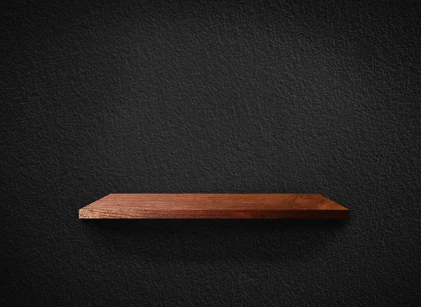 Light wood shelves on black wall texture in loft Style  background with clipping path. Design for wallpaper