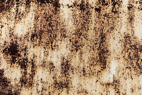 Yüzey duvarı çeliğindeki paslı metalin dokusu. Paslı metal bir levhanın yüzeyi.