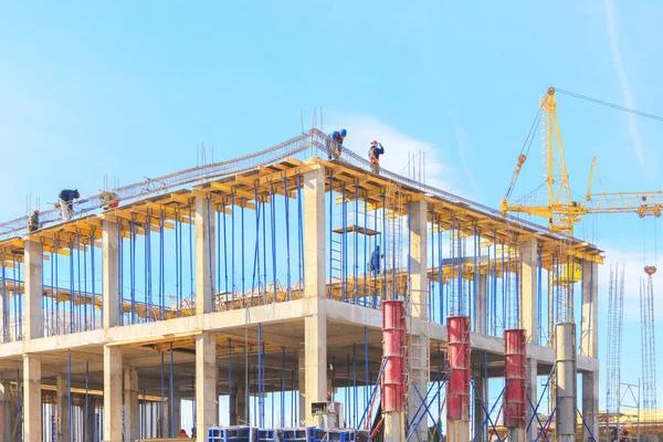 View of the construction site. Tower crane at a construction site. Monolithic frame of the building — Stock Image View Construction Site Tower Crane Construction Site Monolithic Frame Building Stock Photo