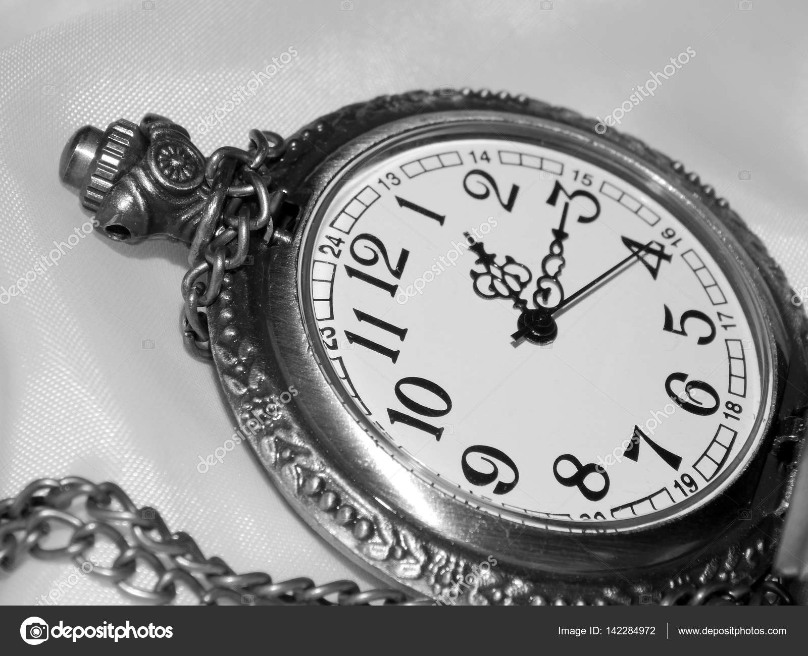 black and white pocket watch