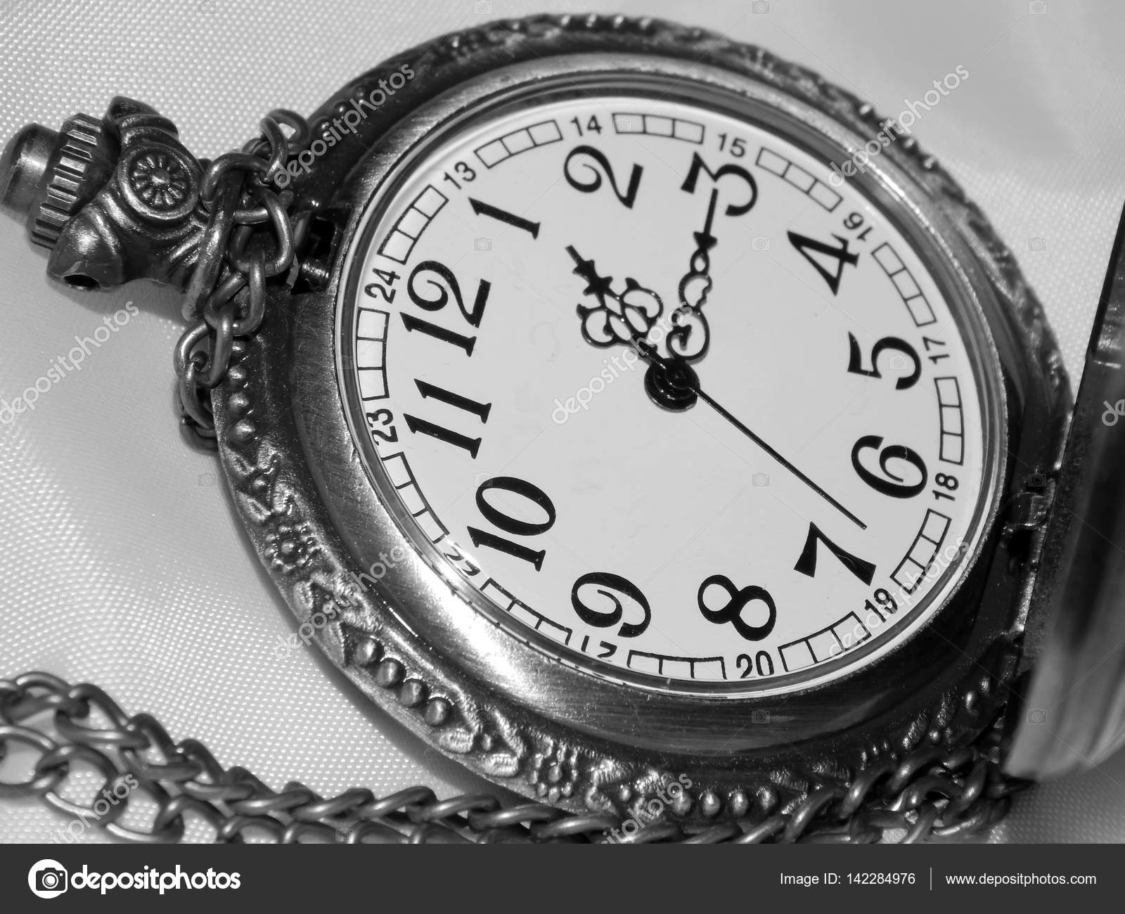 black and white pocket watch