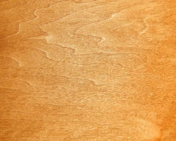 Pintura decorativa de una superficie de madera con oro — Foto de Stock