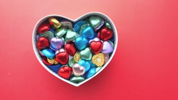 Top view of heart shape candy in a box — Stock Video