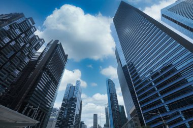 low angle view of singapore financial glass buildings