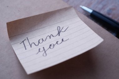 hand written thank you note on paper 