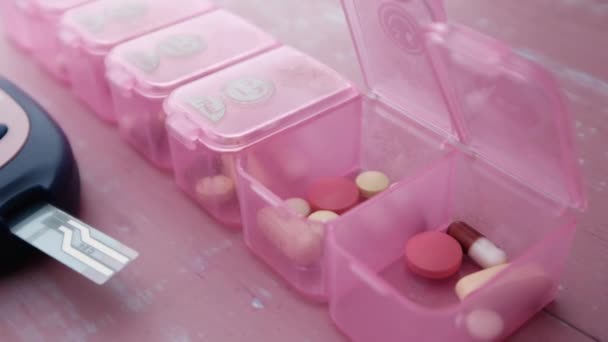 Close up of pills and blood sugar text machine — 비디오