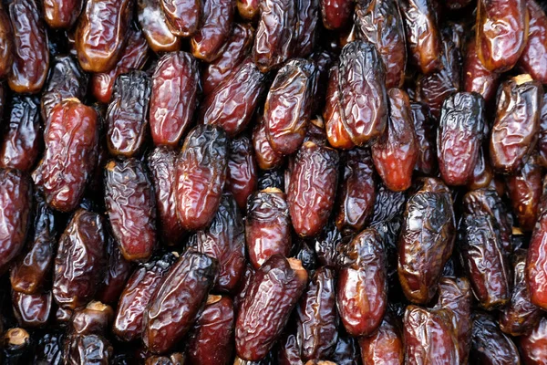 Close up of fresh date fruit for sale. Stock Picture