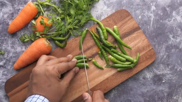 Top view of man hand processing vegetable — Stock Video