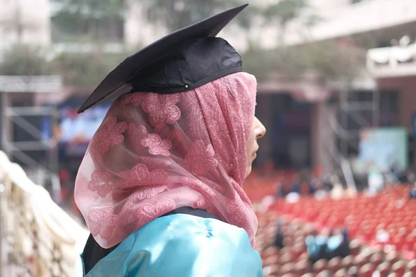 Close up of muslim women wearing graduation hat — Stock Photo, Image