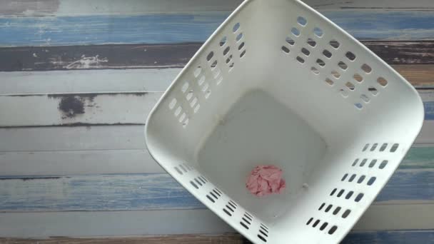 Top view of crumbled paper balls in a bin Stock Footage