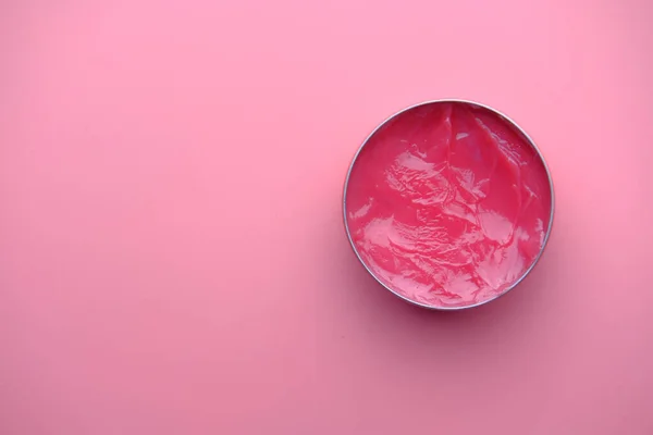 Close up of petroleum jelly on pink background — Stock Photo, Image