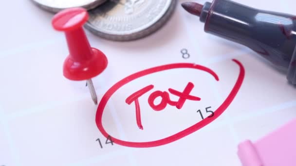 税金の日のテキストで固定された15日のカレンダー. — ストック動画