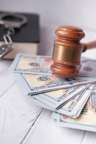 High angle view of gavel and cash on table — Stock Photo, Image