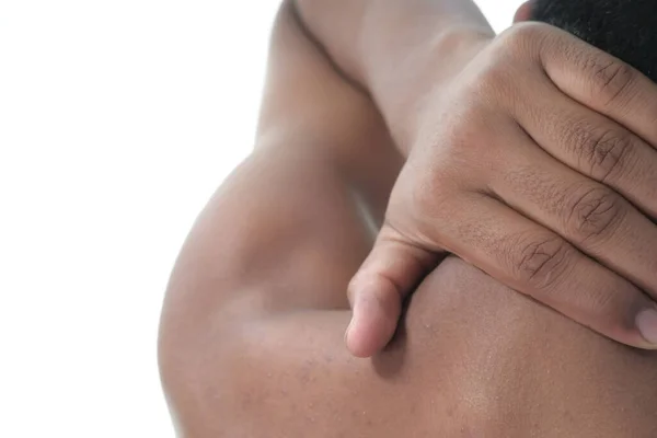 Joven que sufre dolor de cuello aislado en blanco — Foto de Stock