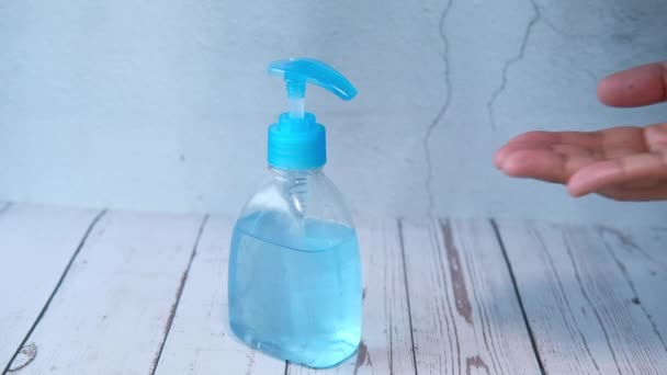 Man using hand sanitizer for preventing virus — Stock Video