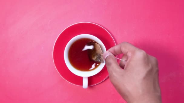 Mans Hand Holding Tea Spoon and Stirring Hot . — стоковое видео