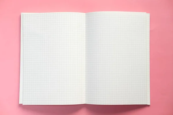 Top view of open notepad on pink background — Stock Photo, Image