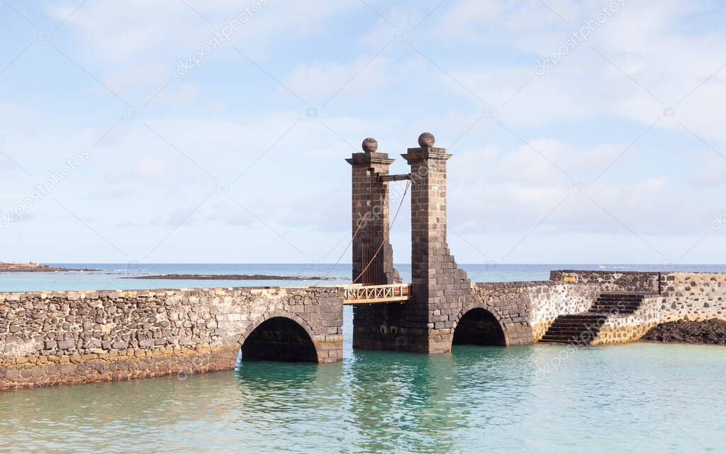 Bridge of the Balls.  Puente de las Bolas leads to San Gabriel Castle in the port city of Arrecife on the Spanish island of Lanzarote.